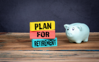 plan for retirement sign with piggy bank